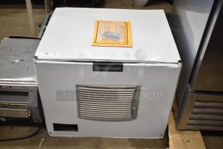Brand new Scotsman MC0330MAX-1A Ice Machine, 30" wide, 400 lb capacity, minor scratches and dents, visible label.