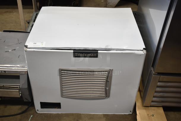 BRAND NEW 2025 Scotsman MC0330MAX-1A ice machine, 400 lb capacity, visible dents, 115V, 1-phase, Scotsman logo displayed.