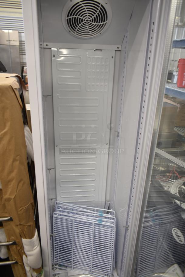 Brand new Galaxy 177GDN5RBW merchandiser refrigerator with white swing glass door, red/white/blue LED lighting, 115V, 1 phase.
