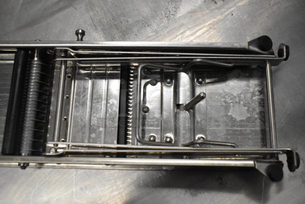 BRAND NEW Bron Coucke 3839 stainless steel mandoline, features interchangeable blade set, minor scratches visible.