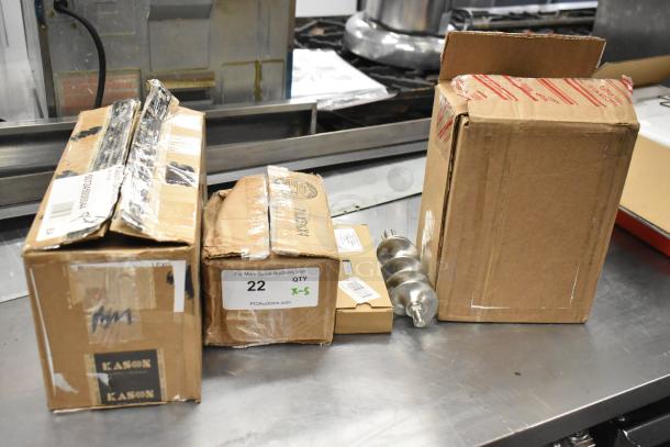 Boxes containing new scratch and dent items including a ballast, AC contactor, and hinge. Kason label visible.