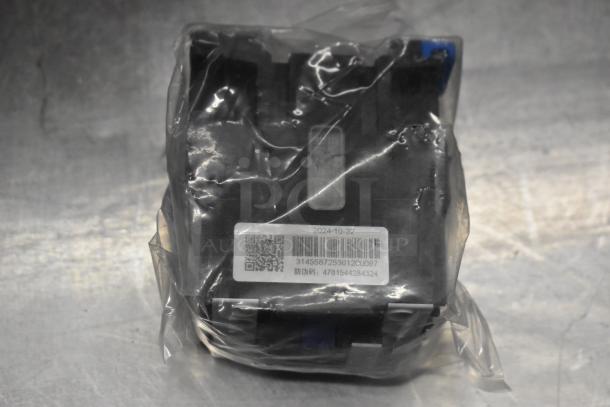 Plastic-wrapped AC contactor with visible barcode and markings. Part of 5 new scratch and dent items, high bid value.
