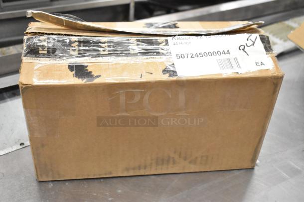 Cardboard box containing 5 scratch and dent items, labeled with barcode and Kason hinge description.