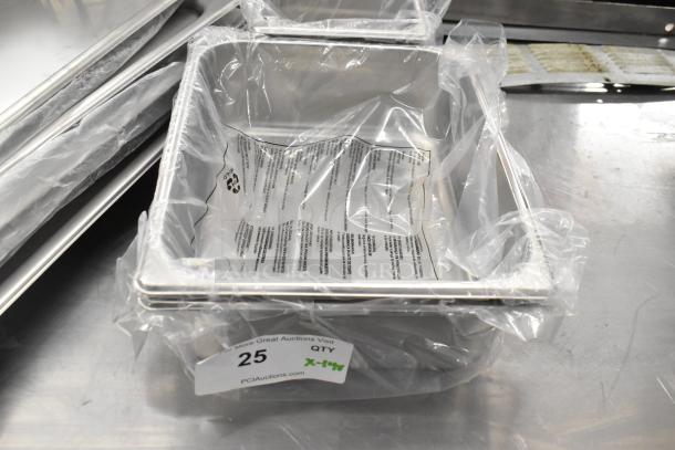 14 new scratch and dent items, including muffin baking pans, lids, and drop-in bins, wrapped in plastic with labels visible.