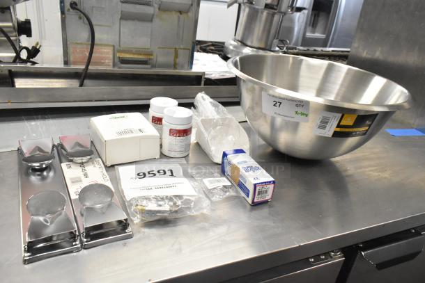 10 new scratch and dent items, including mixing bowl, door switch, cleaning tablets. Stainless steel bowl with label.