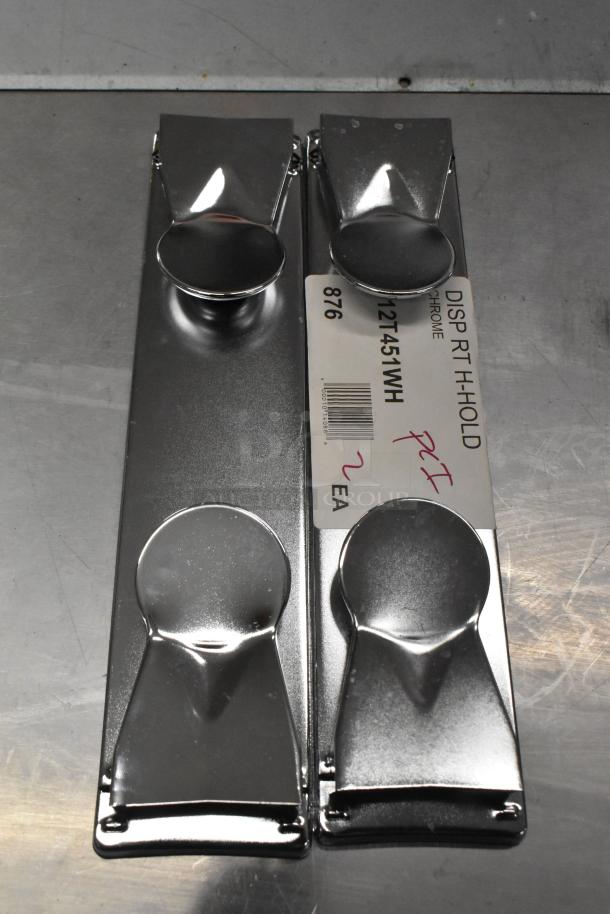 Chrome door switch components, brand new with label indicating part number 12T. Small scratch visible.