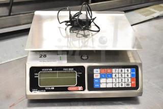 Brand new Torrey L-PC-40L 40 lb. digital price computing scale with minor scratches, legal for trade, includes power adapter.