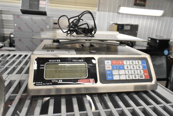 BRAND NEW Tor Rey L-PC 40L 40 lb. digital price computing scale, scratch and dent, legal for trade, model L-PC-40L.