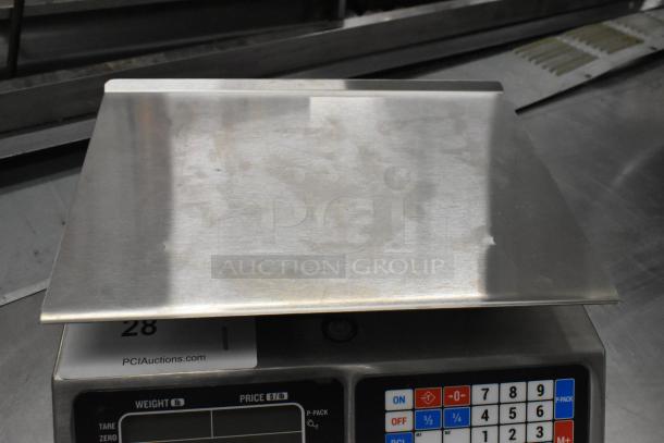 BRAND NEW Torrey L-PC-40L 40 lb. digital price computing scale, legal for trade, with minor cosmetic defects.