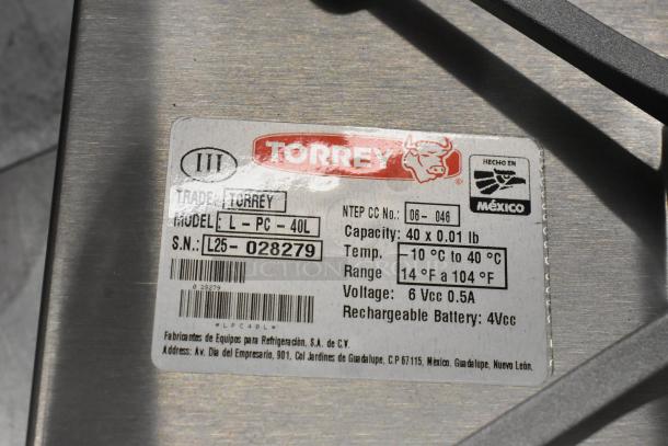Brand new Torrey L-PC-40L 40 lb. digital price computing scale. Legal for trade, scratch and dent condition.