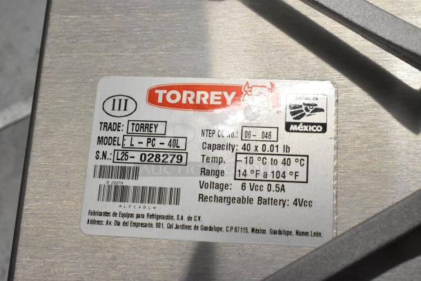 Brand new Torrey L-PC-40L digital price computing scale, 40 lb. capacity, legal for trade. Serial number L25-028279.