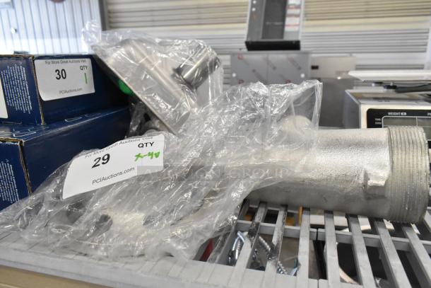 Brand new scratch and dent meat grinder attachment with auger, tray, and pusher, packaged with labels from PCI Auctions.