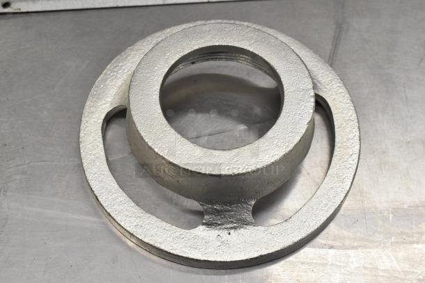 BRAND NEW SCRATCH AND DENT meat grinder attachment part, shows metal ring component.