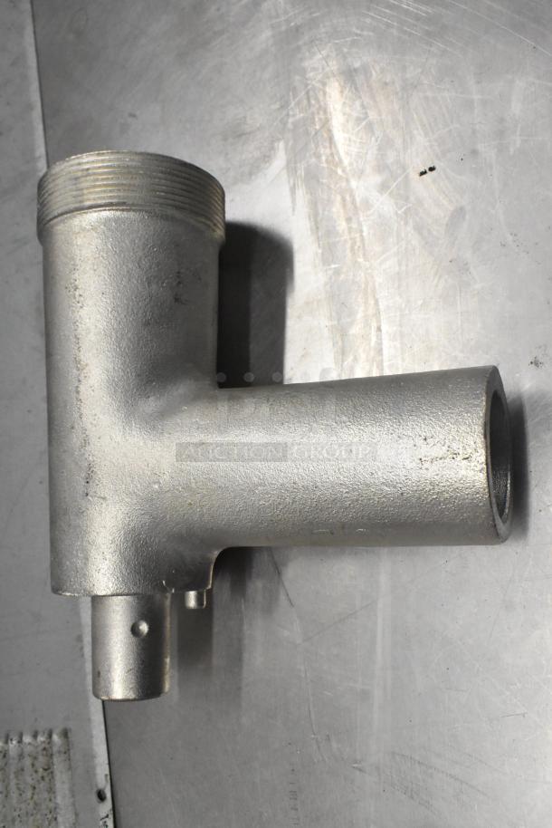 Brand new meat grinder attachment, scratch and dent condition, includes auger, tray, and pusher. Durable metal build.