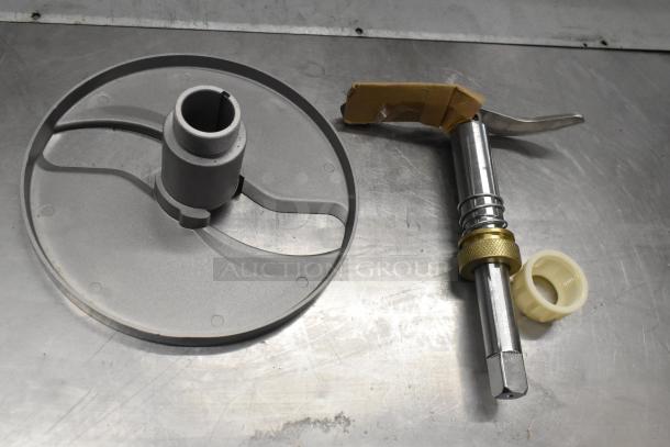 BRAND NEW SCRATCH AND DENT! 190m22hsknif slicer knife assembly for #22 slicer and shredder attachments, metal and plastic components shown on metallic surface.