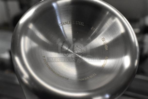Stainless steel base of iSi Gourmet Whip, showing markings: "Stainless Steel", "iSi GmbH", "Austria", "120 Vienna".