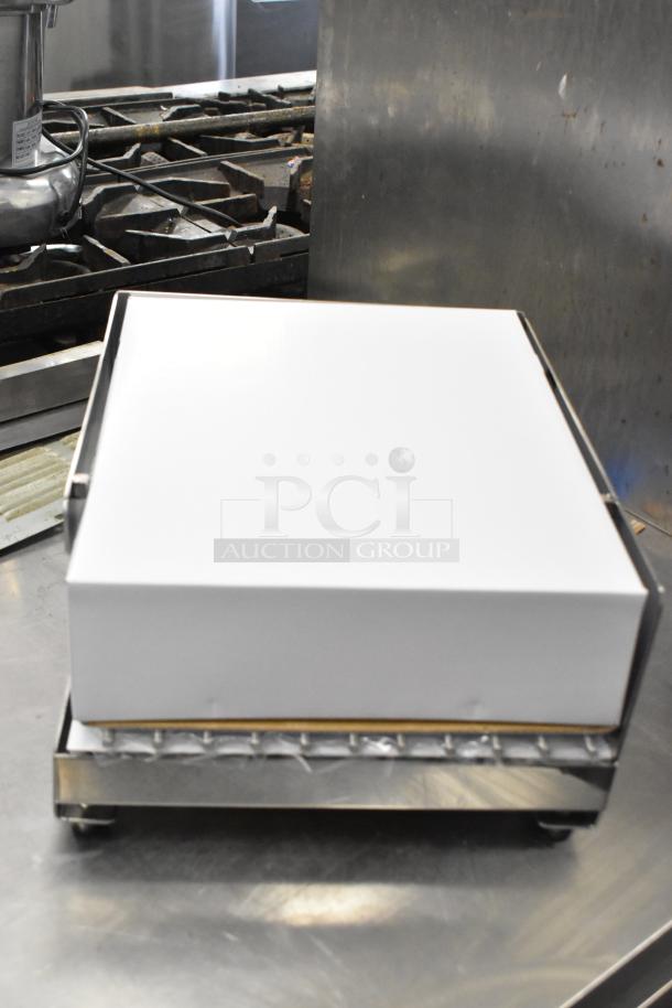 Brand new Chef Master model 90217 stainless steel butane stove cover, 7 3/16" x 14 1/2" x 12", scratch and dent condition.