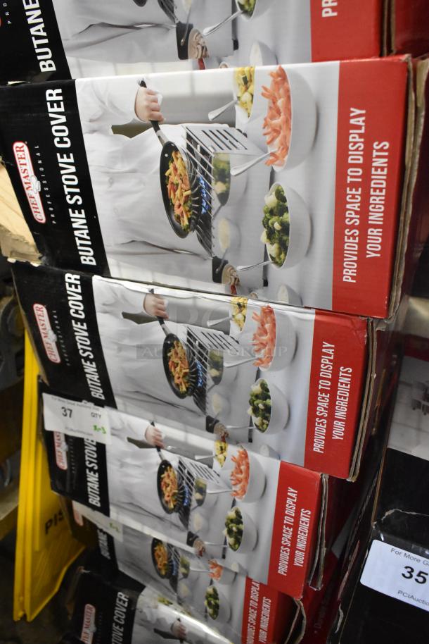 3 new Chef Master 90217 stainless steel butane stove covers, 7 3/16" x 14 1/2" x 12", visible boxes with product image.