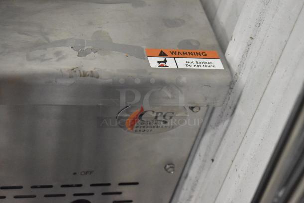 Brand new Cooking Performance Group WOKR13L propane wok range, 13" ring, 95,000 BTU, scratch and dent, warning label visible.