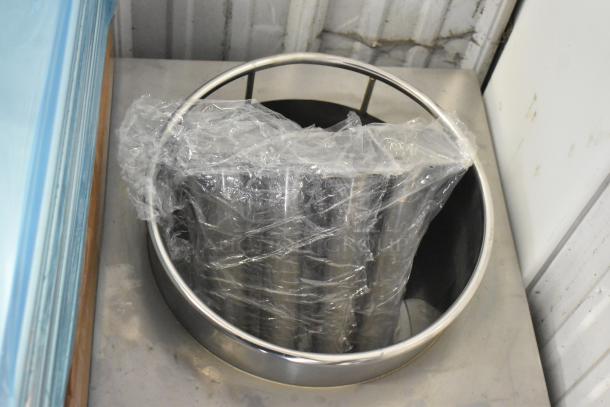 Brand new Cooking Performance Group WOKR13L propane wok range, 13" ring, 95,000 BTU, in packaging; scratch and dent condition.