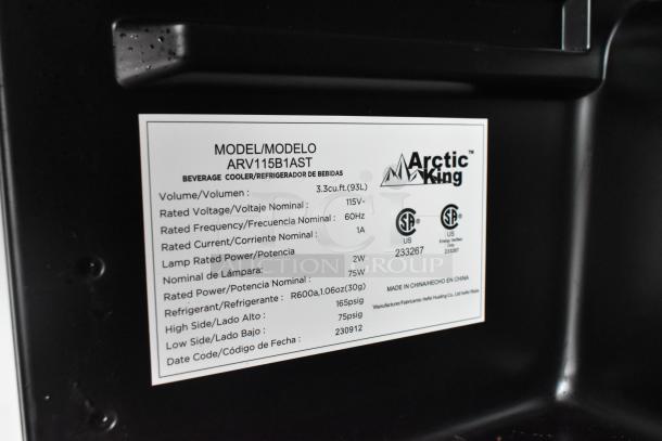 Arctic King ARV115B1AST Mini Cooler Merchandiser, 115V, label detailing model specs and energy verification marks.