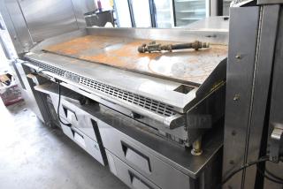 American Range commercial griddle on 4-drawer chef base, stainless steel, visible rust on surface, ideal for high-volume kitchens.