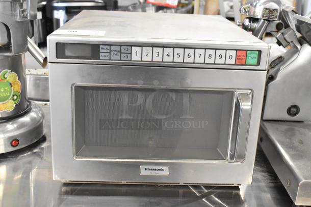 Panasonic NE-21521 Commercial Microwave Oven, stainless steel, countertop model, numeric keypad, 208V, used condition.