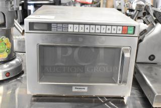 Panasonic NE-21521 Commercial Microwave Oven, stainless steel, countertop model, numeric keypad, 208V, used condition.