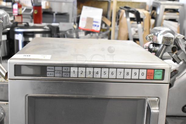 Panasonic NE-21521 commercial microwave, keypad controls, 208V, 1 phase. Slight wear, ideal for high-volume use.