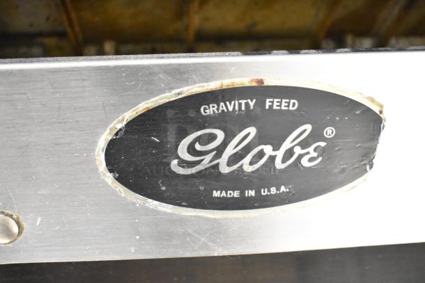 Globe Commercial Countertop Meat Slicer with Blade Sharpener, 115 Volts, 1 Phase, Gravity Feed, Made in USA.