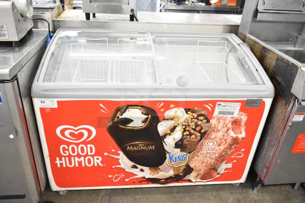 AHT RIO S 125 commercial freezer merchandiser, 115 volts, 1 phase, with Good Humor branding. Clear sliding lid in good condition.