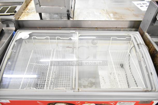 AHT RIO S 125 commercial freezer merchandiser with glass sliding doors, two interior baskets, 115 volts, 1 phase.