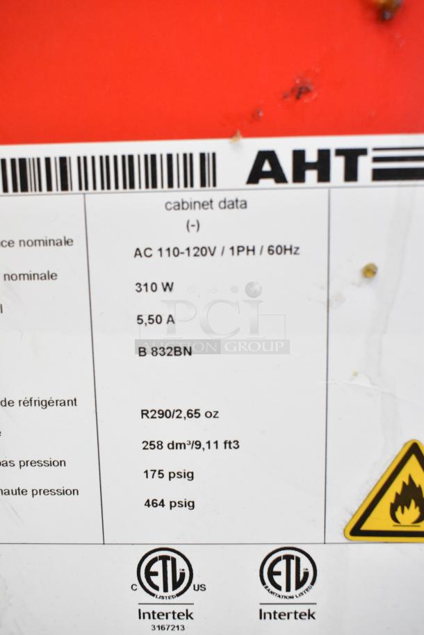 AHT RIO S 125 Commercial Freezer Merchandiser label showing 115 volts, 1 phase, ETL listed. Model data and safety markings visible.