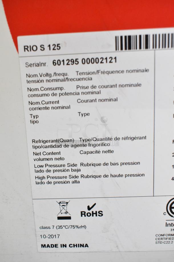 AHT RIO S 125 Commercial Freezer, 115V, 1 Phase. Label shows model, serial number, voltage, power details, and RoHS compliance.