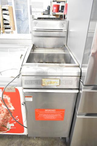 Qualite Commercial Floor Gas Deep Fat Fryer, stainless steel, used, visible brand logo and safety warning label.