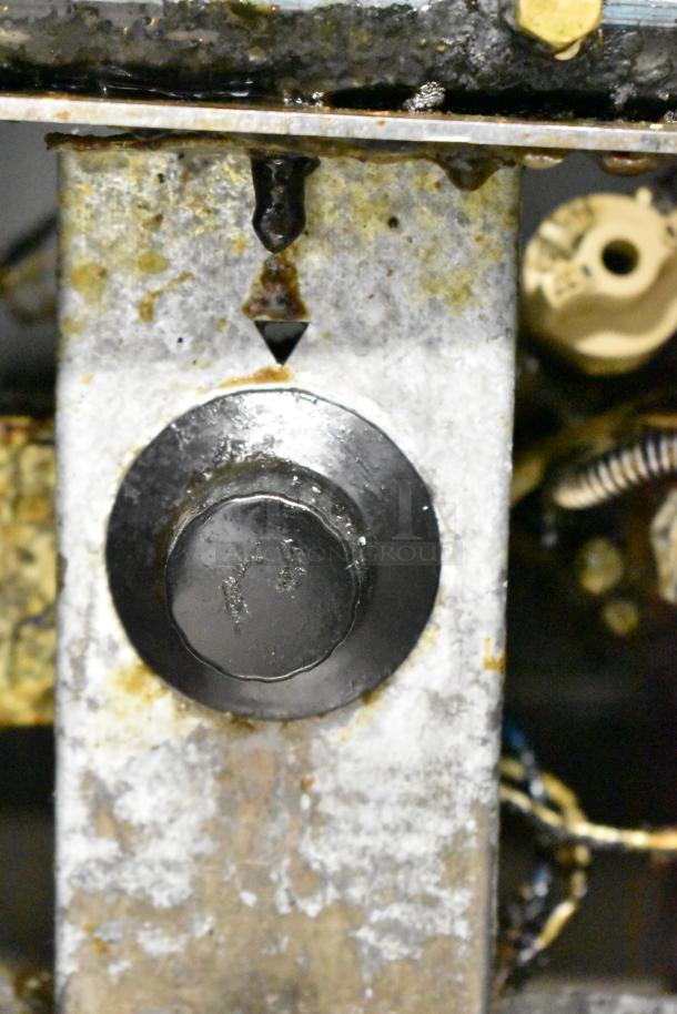 Qualite Commercial Floor Style Gas Powered Deep Fat Fryer, close-up view showing usage wear.