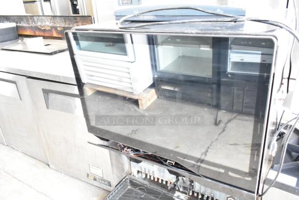 Stainless steel Scotsman NH0622A-1B ice head on Lancer TP30 beverage dispenser with touchscreen, automatic agitation.