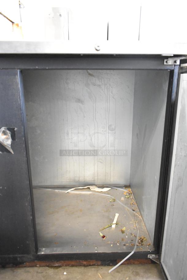 Micro Matic MDD-94 kegerator interior, showing signs of wear and debris. Model: MDD-94. 115 volts, 1 phase.