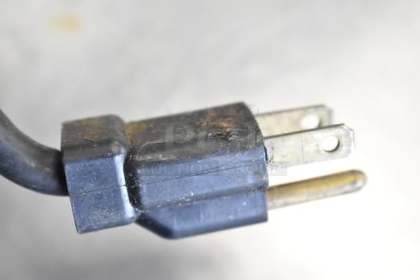 Close-up of a used plug for the Micro Matic MDD-94 Commercial Direct Draw Kegerator. 115 Volts, 1 Phase.