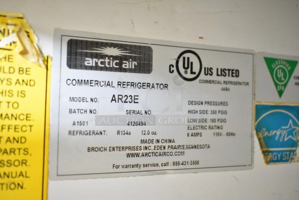 Arctic Air AR23E commercial cooler label showing model, serial number, refrigerant type, and electrical specifications.