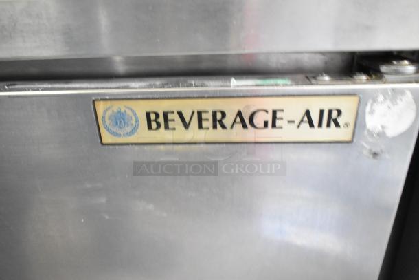 Beverage Air WTR72AY 3-door undercounter cooler with commercial casters, stainless steel, 115 volts, 1 phase, visible brand logo.