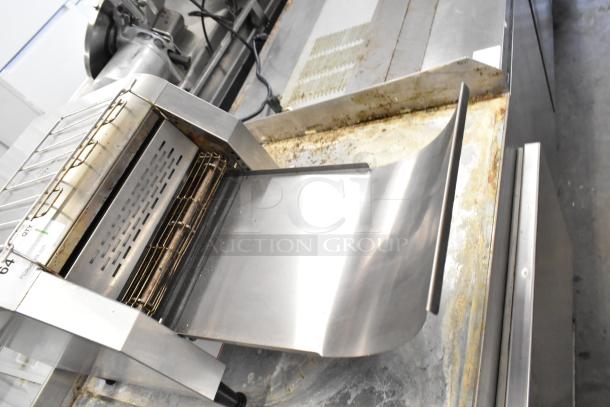 2023 BI006192 Commercial Conveyor Toaster Oven, 110 Volts, 1 Phase. Visible wear on conveyor. Ideal for high-volume use.