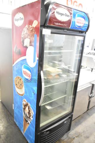 Minus Forty 22-USGF-X1-1C003-BK-NESTLE commercial freezer, single-door, branded with Häagen-Dazs and Nestlé logos, 115V, used condition.