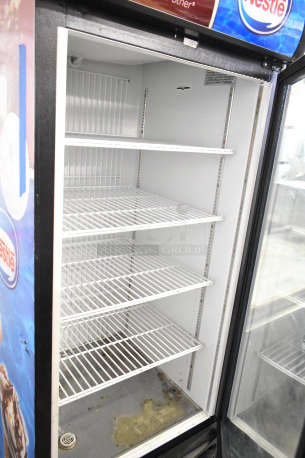 Minus Forty 22-USGF-X1-1C003-BK-NESTLE single-door freezer merchandiser, 115V, 1-phase, visible Nestle branding, five wire shelves.