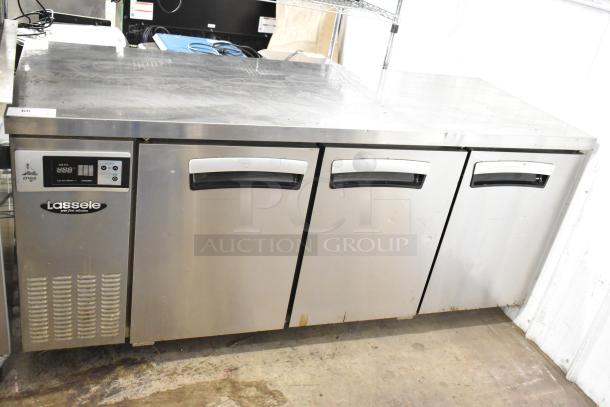 Lassele LT-1833R commercial 3-door undercounter cooler, stainless steel, visible brand logo, digital display, used condition.