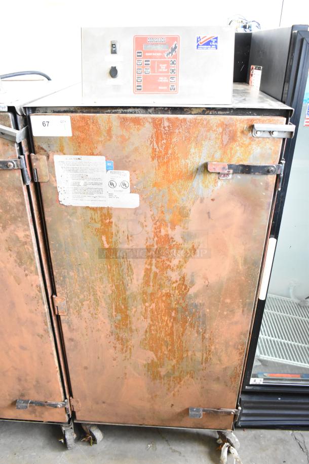Cookshack 250 Commercial Electric Smoker with casters, 208V, 1 phase. Rust on door, control panel visible. UL label indicated.