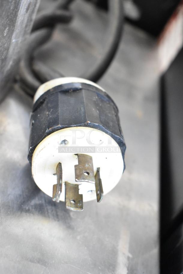 Cookshack 250 Commercial Electric Smoker plug, 208V, 1 phase, shown with metal connectors. In used condition.