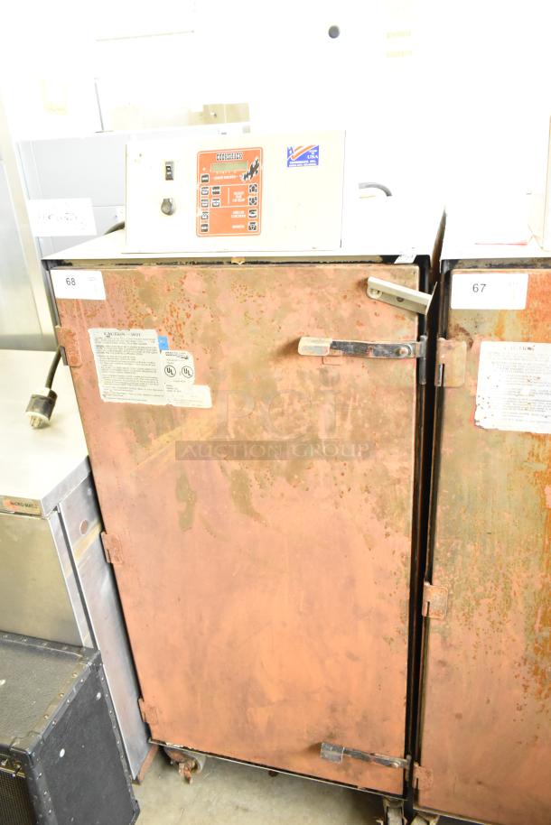 Cookshack 250 Commercial Electric Smoker on casters. 208V, 1 Phase. Visible control panel, used condition.