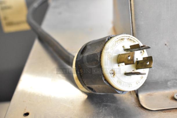 Cookshack 250 Commercial Electric Smoker plug. High-quality, durable design; requires 208 volts, single-phase power.