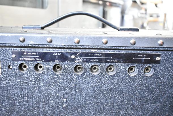 Roland Jazz Chorus 120 Speaker, black textured finish, control panel with inputs labeled for ext. speakers, line out, footswitch.